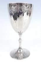 A Victorian silver presentation goblet, of circular bell shape upon a knopped stem and circular