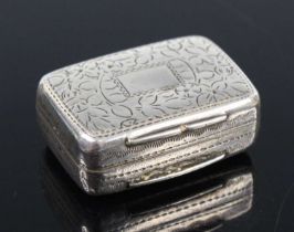 A George IV silver vinaigrette, having all-over leaf and flower engraved decoration, the hinged