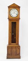 An early Victorian oak longcase regulator, having an unsigned circular white enamel Roman 12"