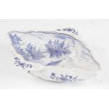 A Delft blue and white twin handled sauceboat, 18th century, decorated with a boat before a
