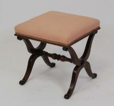 A Victorian rosewood X-framed dressing stool, having a re-upholstered stuffover seat, w.44cm, h.46cm