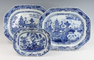 A pair of Chinese blue and white porcelain meat plates, 18th century, each decorated with a pagoda