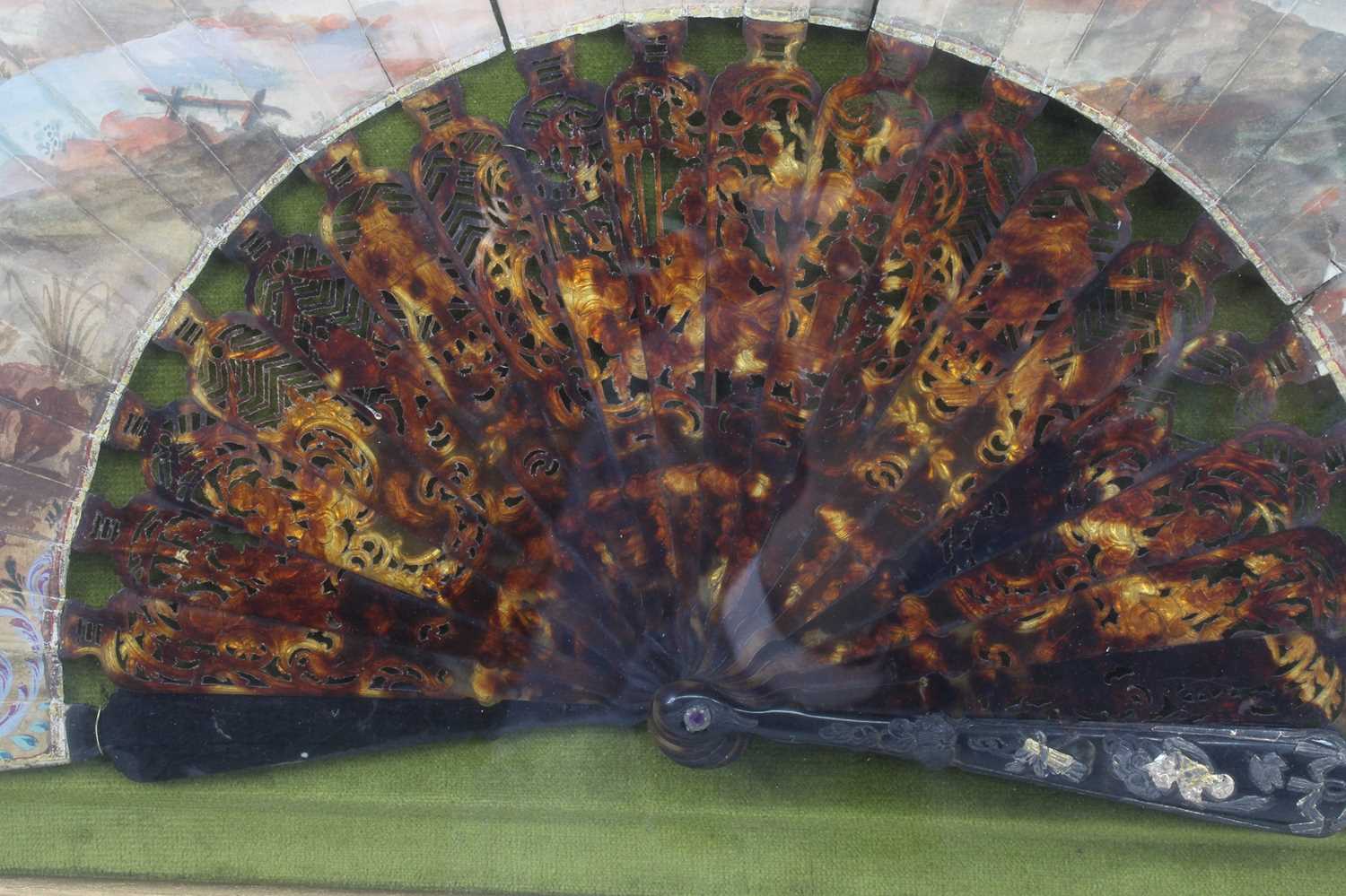 A late 19th century tortoiseshell and painted fan, the sticks each with pierced carving, the fan - Image 3 of 3