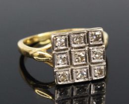 An 18ct yellow and white gold diamond rectangular cluster ring, comprising nine single cut