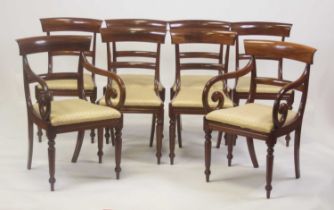 A set of eight Victorian mahogany barback dining chairs, each with drop-in seats and on ring