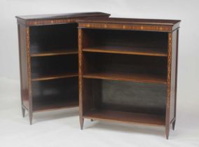 A pair of Edwardian mahogany and inlaid freestanding open bookshelves, having satinwood and