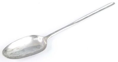 A George III silver spoon with marrow scoop stem, having a simple shallow bowl with shell back,