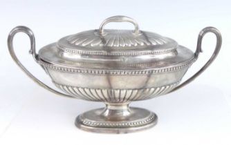 A George III silver lidded twin handled pedestal dish, the body of oval half-reeded form with beaded