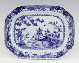 A Chinese blue and white export porcelain meat plate, 18th century, decorated with a pagoda within a