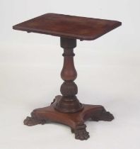 An early Victorian oak pedestal occasional table, the rectangular tilt-top having a moulded edge and