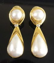 A pair of 18ct yellow gold pearl and diamond drop earrings, each comprising a 19.1 x 12.1mm pear