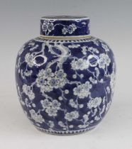 A Chinese blue and white porcelain ginger jar and cover, 19th century, of globular form, decorated