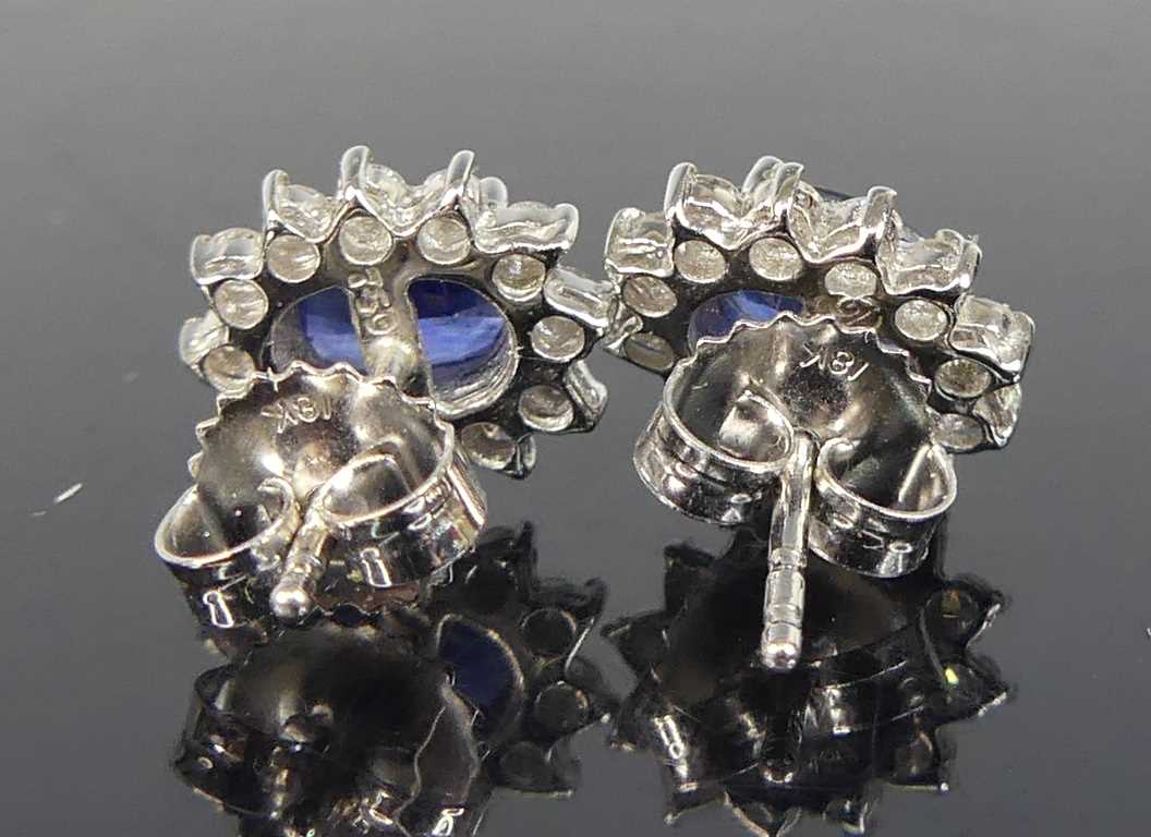 A pair of white metal sapphire and diamond oval cluster earrings, each comprising an oval sapphire - Image 4 of 4