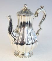 A William IV silver pedestal coffee pot, of lower bulbous melon form to a spreading foot, the hinged
