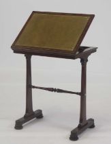 A Regency mahogany and brass inlaid reading table, having a gilt-tooled leather inset hinged and