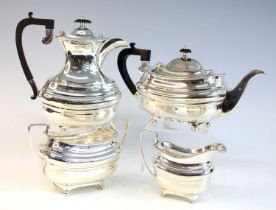 A George V silver four-piece tea and coffee service, comprising teapot, coffee pot, sugar bowl and