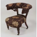 A William IV rosewood cockfighting chair, having a buttonback re-upholstered top rail and