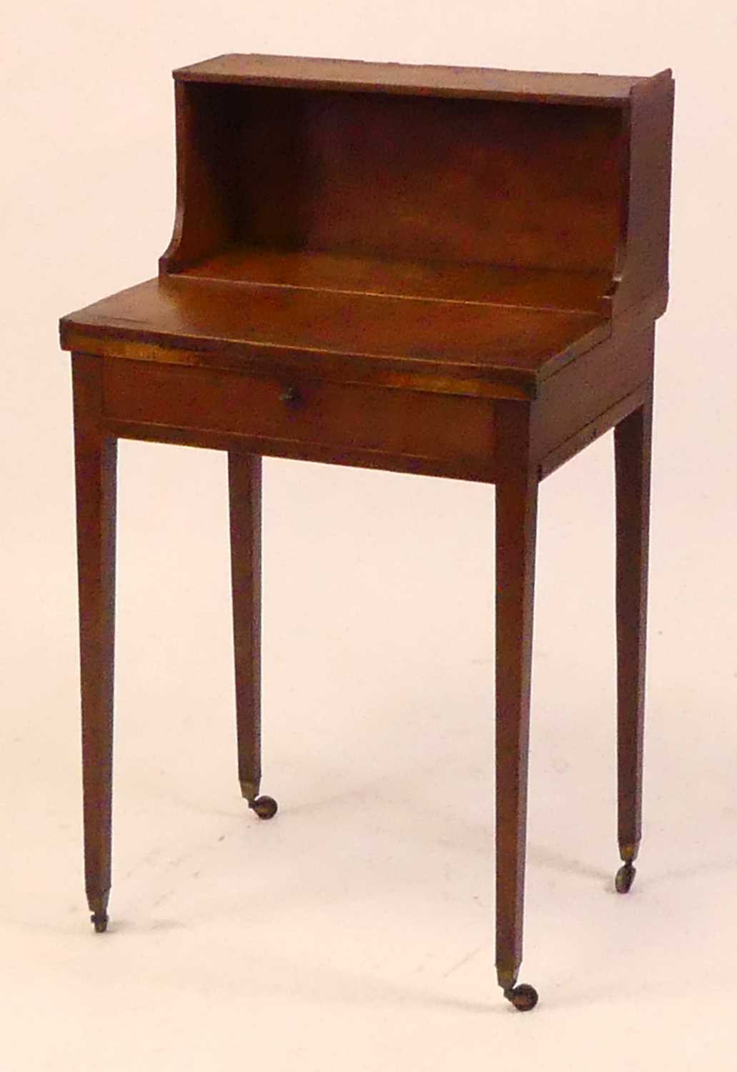 A 19th century amboyna and inlaid bonheur du jour of small proportions having a raised