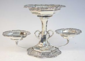 An Edwardian silver triform table centrepiece, as a pedestal stand with central column and two