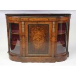 A Victorian figured walnut and inlaid breakfront credenza, having gilt metal mounts and bowed glazed