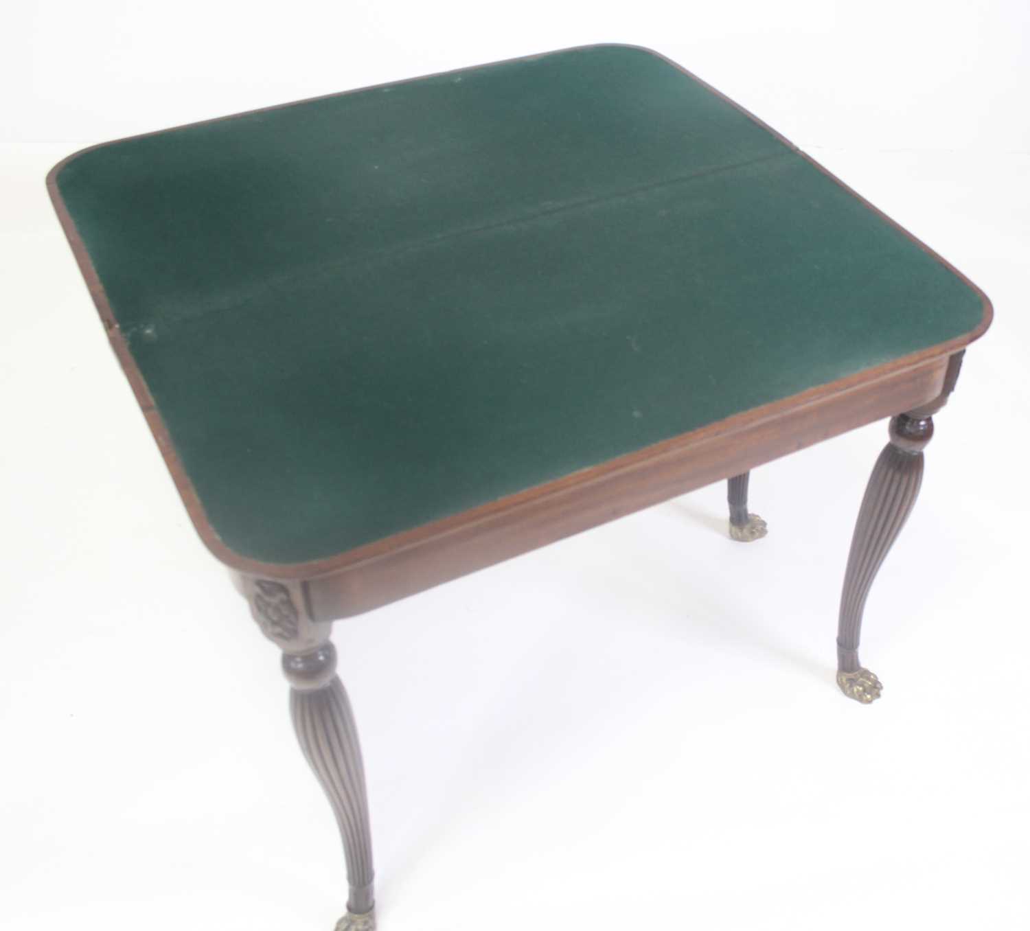 A George III Irish mahogany card table, the D-shaped fold-over top having a reeded edge and on - Image 3 of 12