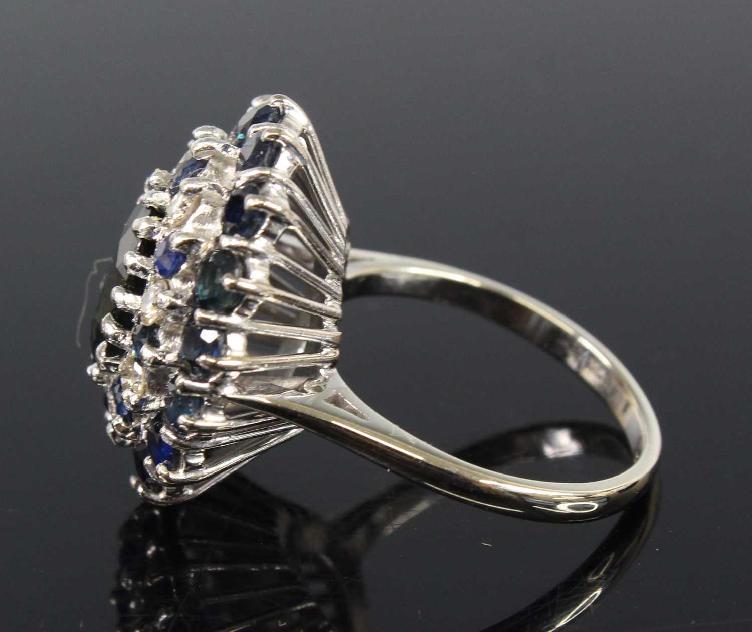 An 18ct white gold, sapphire and diamond oval cluster ring, featuring a centre oval sapphire - Image 3 of 4