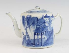 A Chinese blue and white porcelain teapot, 18th century, of cylindrical form, having a crossover