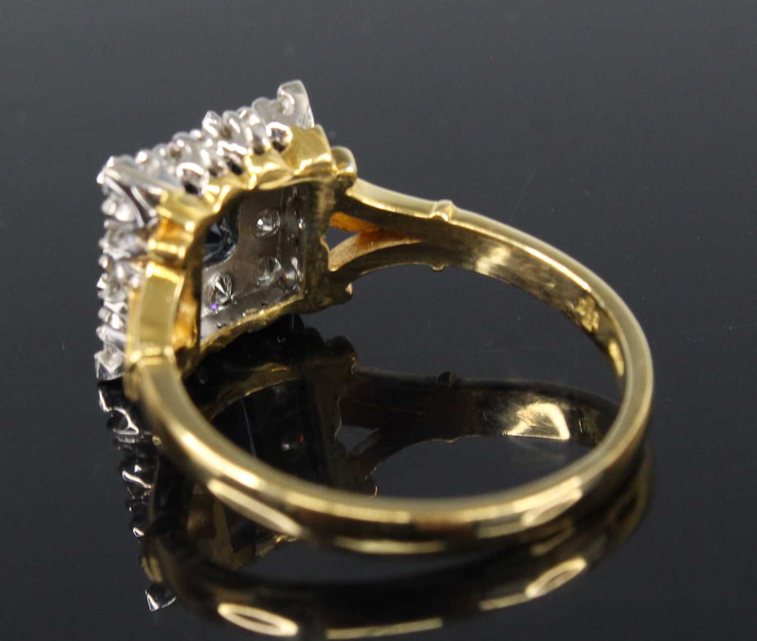 An 18ct yellow and white gold, synthetic sapphire and diamond square cluster ring, featuring a - Image 3 of 3