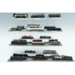 An extensive collection of Del Prado model railway locomotives, each on a platform bearing the name