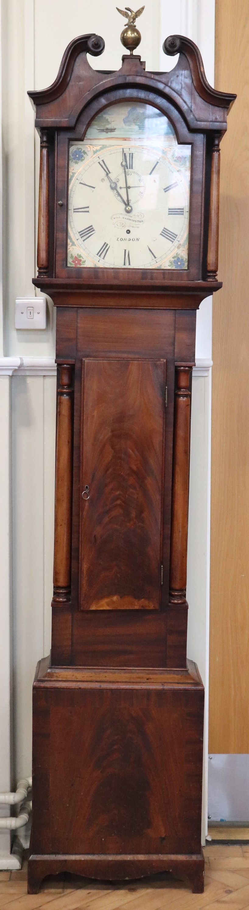 A George III mahogany 8 day long case clock, having a single train 'bolt and shutter' movement,