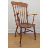 A George V Windsor arm chair, various timbers, 112 cm high