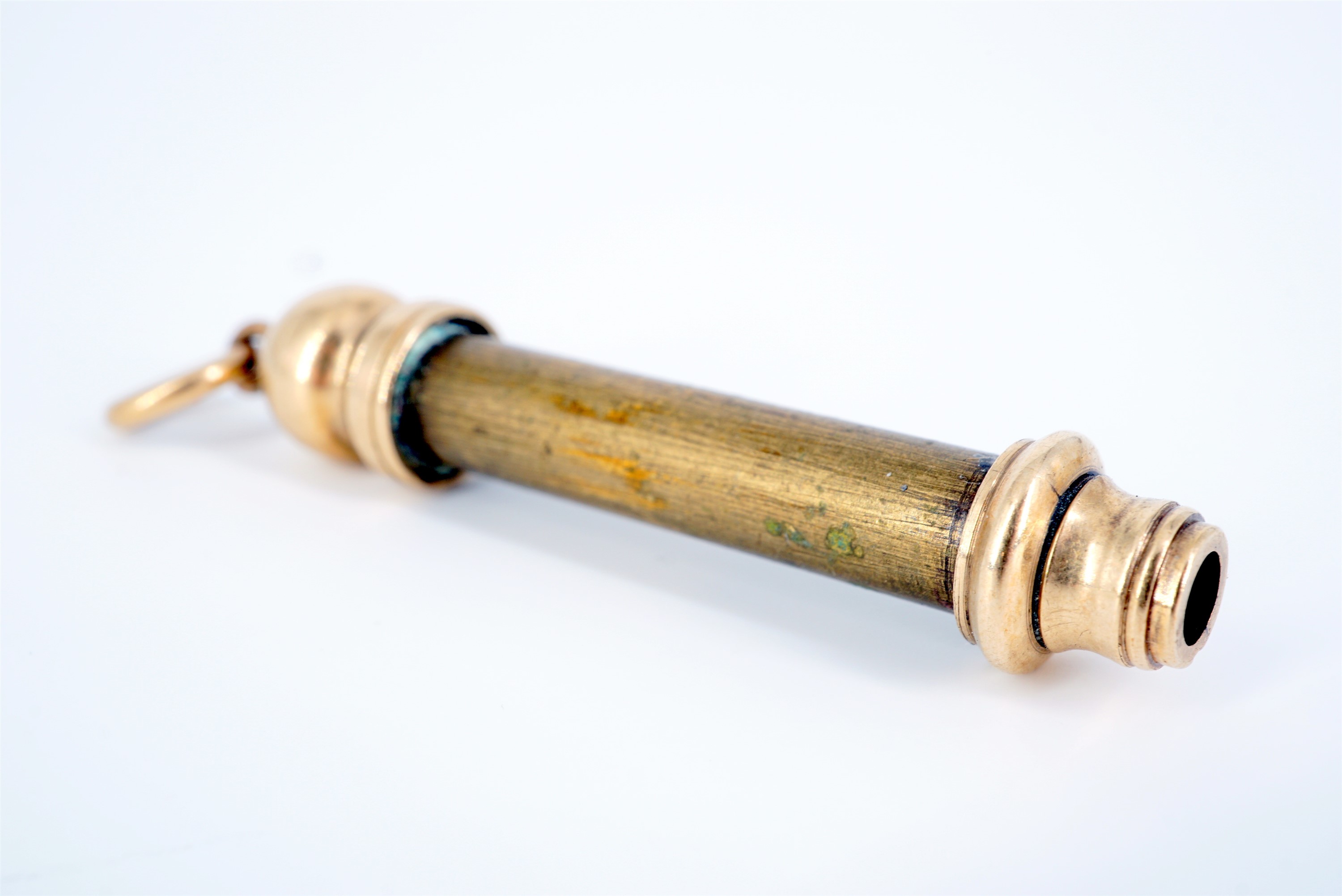 An early 20th Century Sampson Mordan and Co yellow metal propelling fob pencil, bearing maker's name