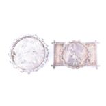 Two Victorian silver Aesthetic Movement influenced brooches, each decorated in depiction of a