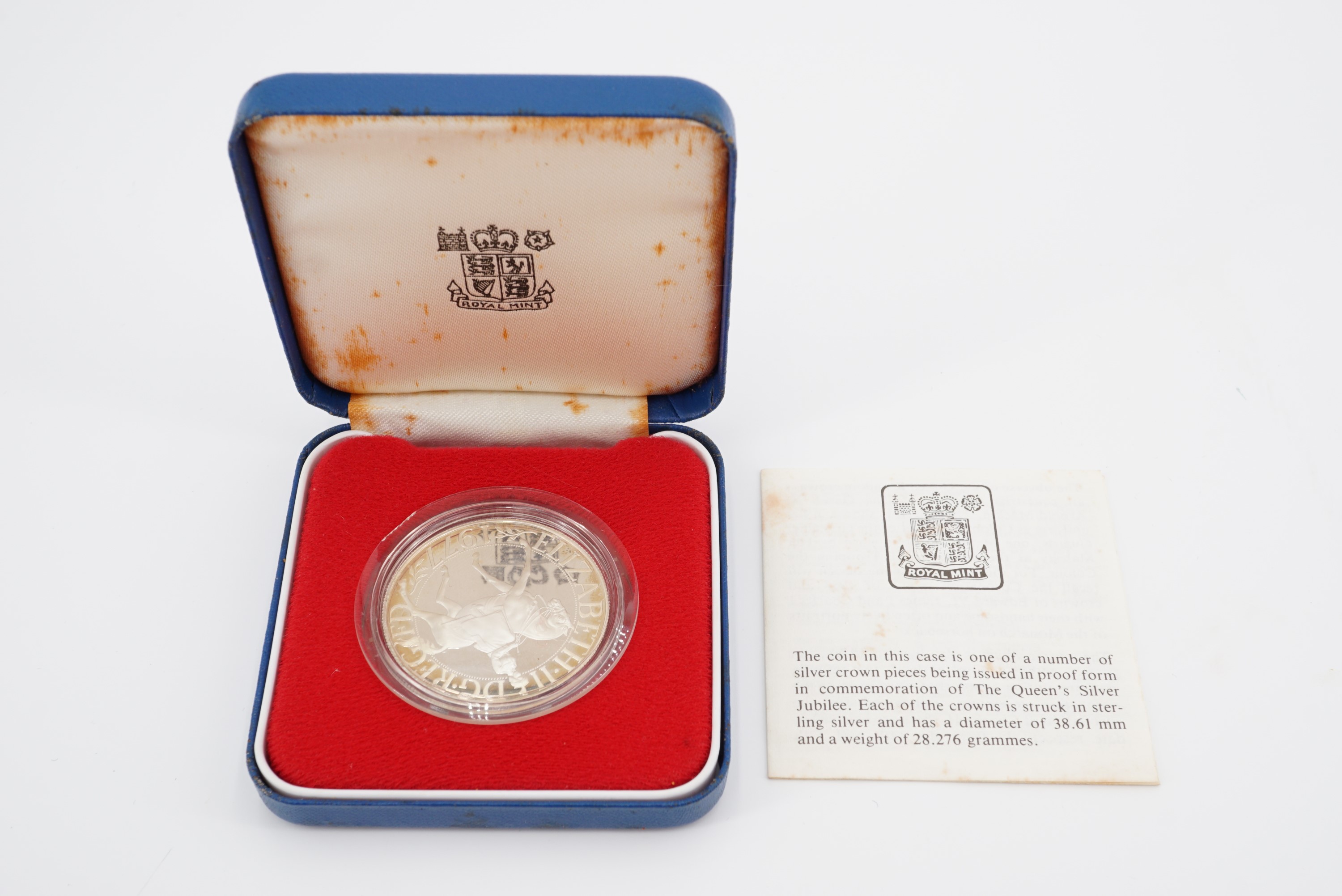 A cased Royal Mint 1977 Queen's Silver Jubilee sterling silver proof crown coin