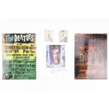 Two The Beatles reproduction concert posters on timplate, together with two facsimile signed