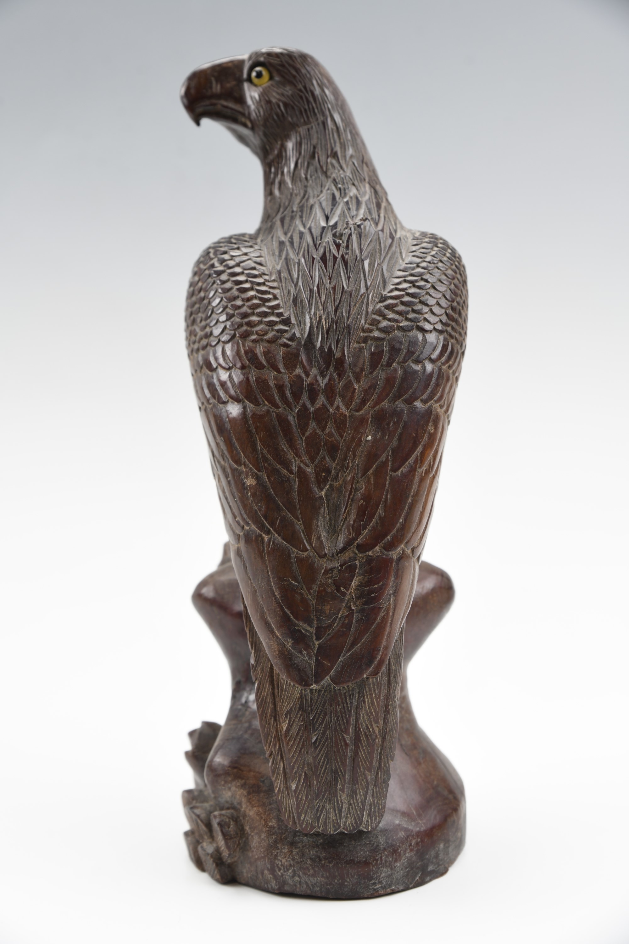 A Japanese carved wooden figure of a perched eagle, having glass eyes, late 19th / early 20th - Image 3 of 3