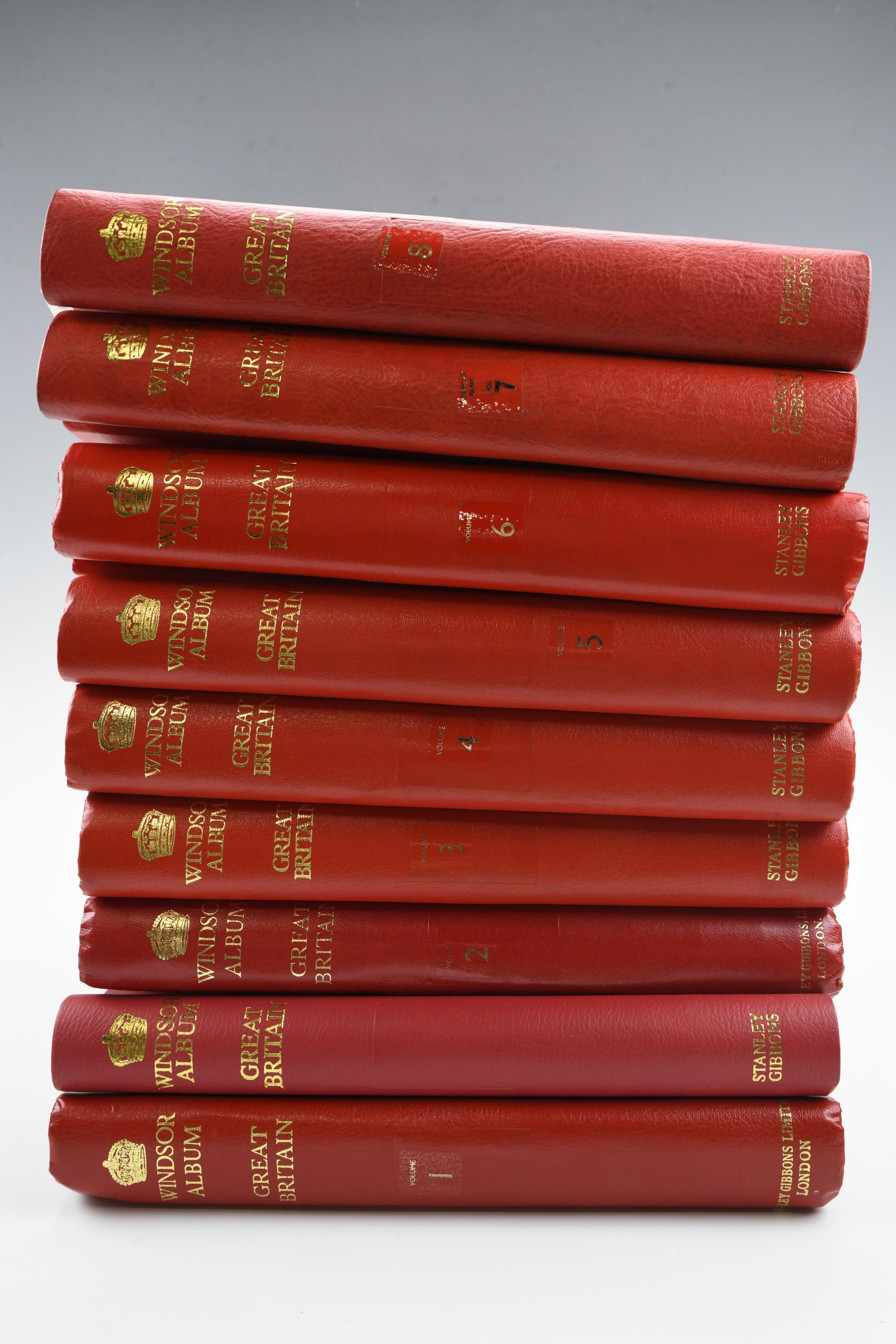 Nine Stanley Gibbons Windsor stamp albums, containing a large quantity of franked and unfranked GB