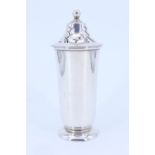 An Art Deco silver sugar caster, of gently tapering cylindrical form on a footed base, the top