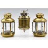 A pair of late 20th Century spun brass hanging tea-light lanterns, having star cut glass sides