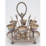 A Victorian electroplate egg cup set, with stand and associated spoons, Roberts and Belk