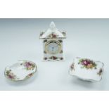 A Royal Albert Old Country Rose clock, 17 cm. and two pin dishes