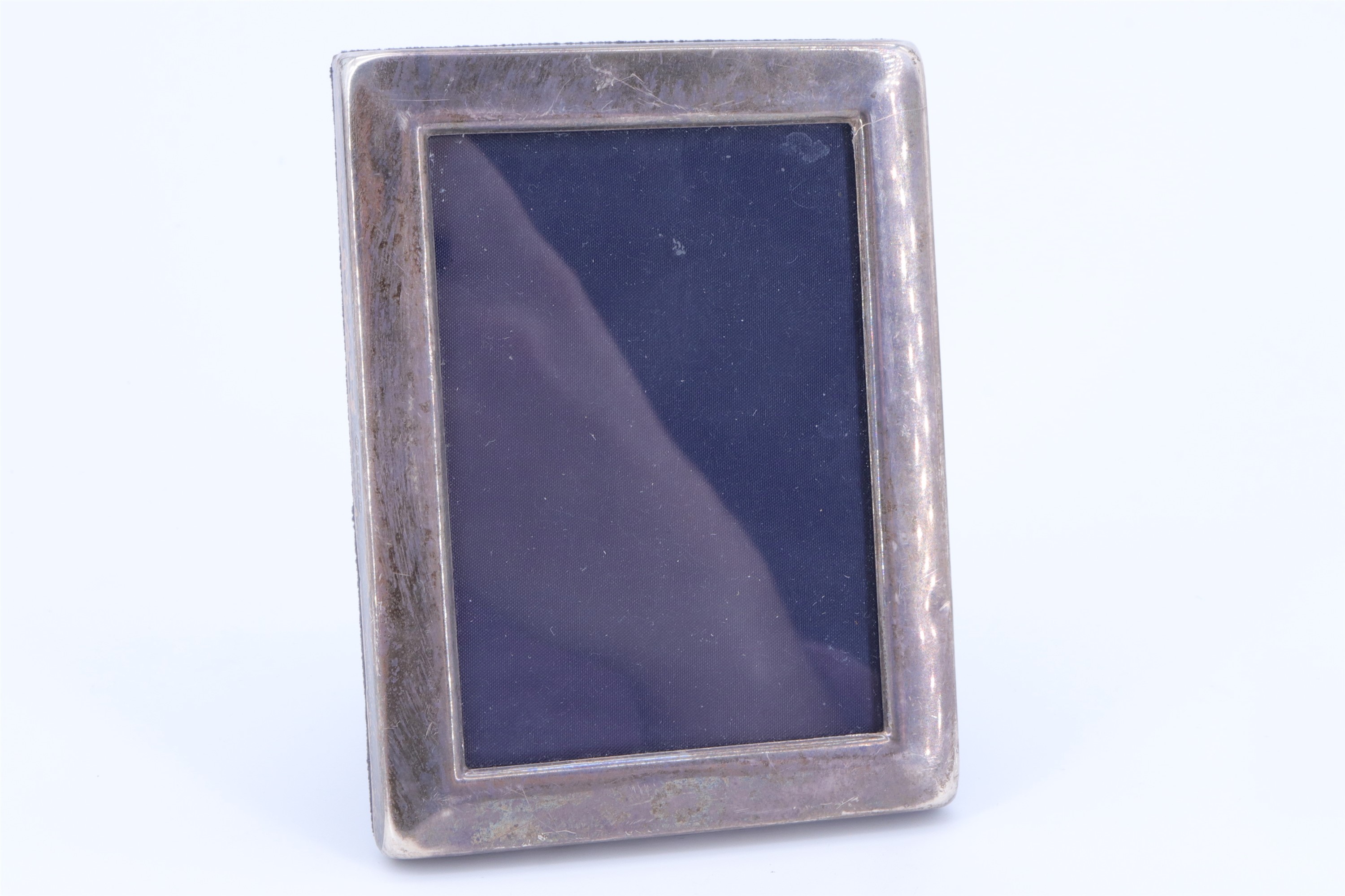 A late 20th Century silver-faced photograph frame, 10.5 cm x 8 cm
