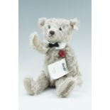 A late 20th Century limited edition Steiff musical teddy bear, 'Comme D'Habitude', having an