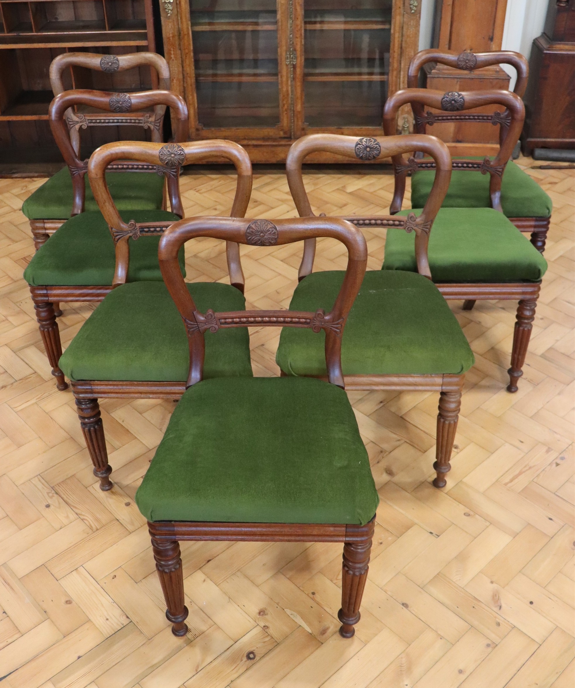 A set of seven Regency mahogany spoon back dining stand chairs, having Gillows style reeded legs and - Image 2 of 2