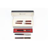 A cased SZ Leqi of Paris fountain and ball point pen set, together with a Parker Frontier, one other