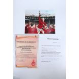 [ Autographs ] An autographed photograph of the 1966 England World Cup football team, signed by 10