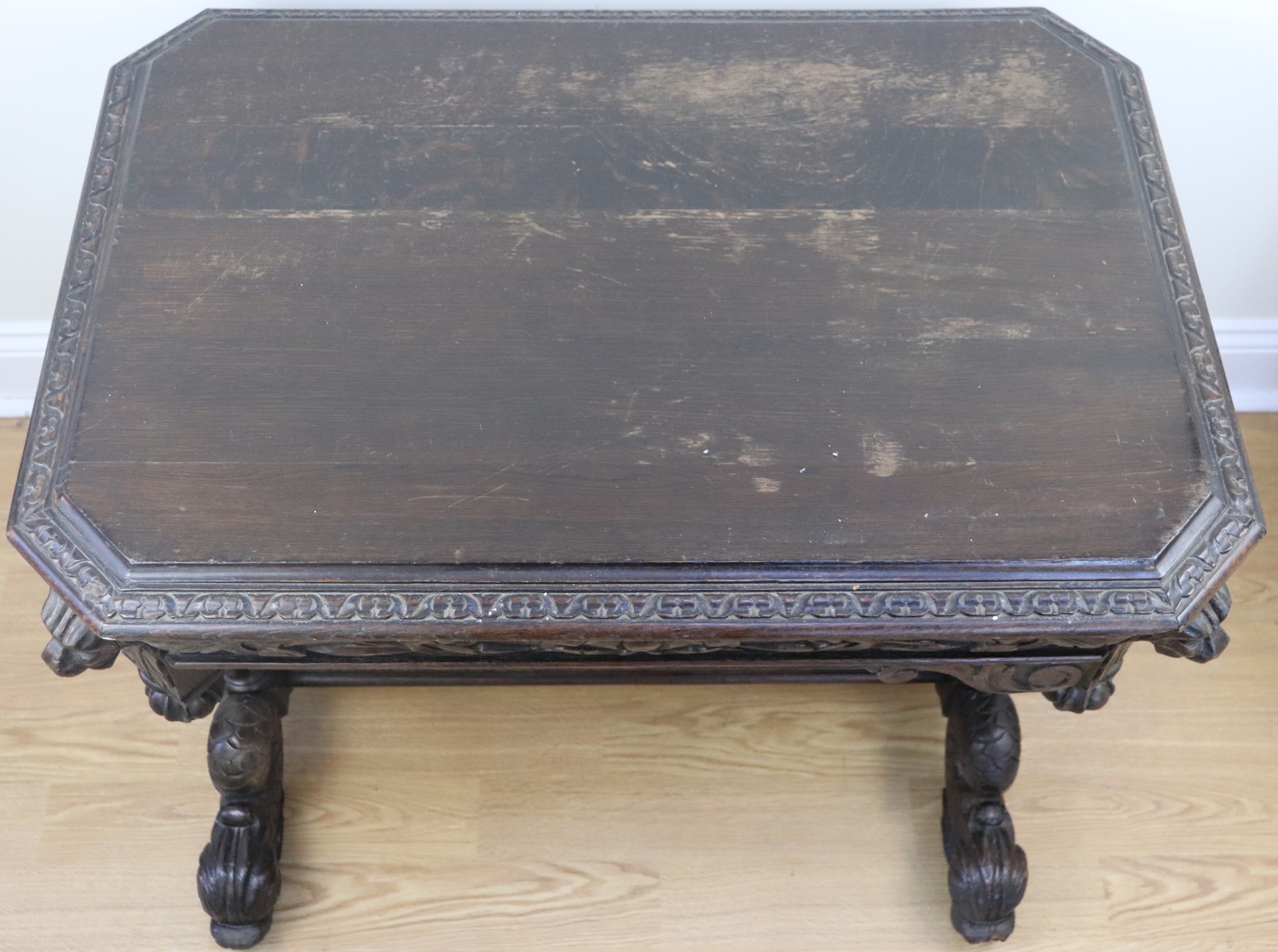 A late 19th / early 20th Century Flemish style heavily carved oak writing table, decorated overall - Image 2 of 3