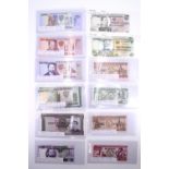 A group of uncirculated African banknotes, Mozambique and Angola
