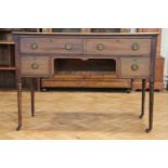 An Edwardian mahogany dressing table, having string inlay and raised on tapering turned legs, 114
