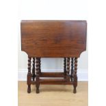 A George V diminutive barley twist drop leaf table, 61 x 31 x 71 cm closed (61 x 92 cm open)